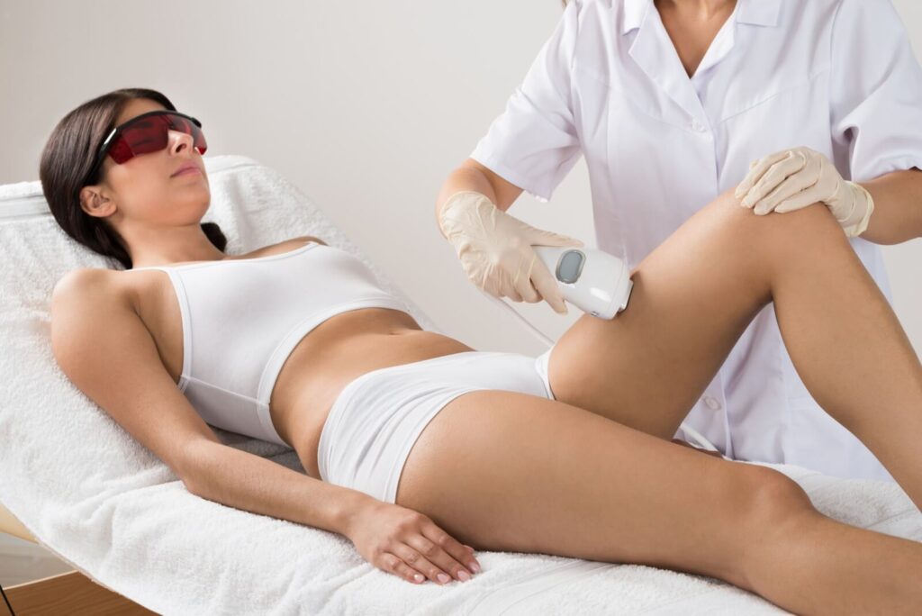 aesthetician finishes up laser hair removal near the bikini area in Nashville, TN